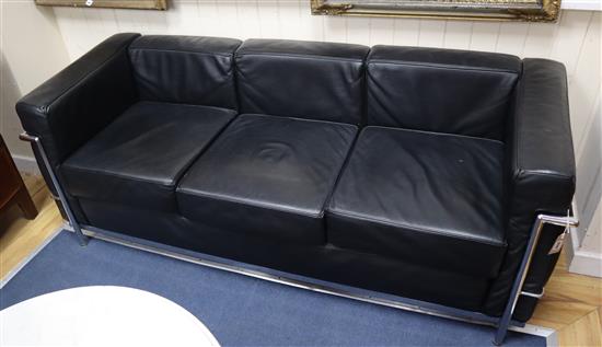 A Corbusier style chrome and black leather three seater settee W.180cm